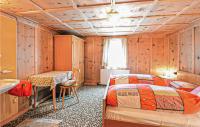 Łóżko lub łóżka w pokoju w obiekcie Ferienhaus Naehe Ischgl