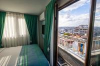 Postel nebo postele na pokoji v ubytování Santa Rio Gold Taxim Hotel