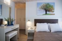 Posteľ alebo postele v izbe v ubytovaní Enali Villas