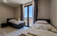 Posteľ alebo postele v izbe v ubytovaní Nice Apartment In Orebic With Kitchen