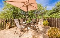 A garden outside Cozy Home In Algatocin With Kitchenette
