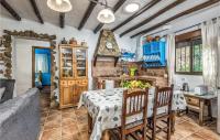 A seating area at Cozy Home In Algatocin With Kitchenette
