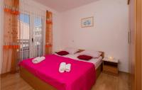 Postel nebo postele na pokoji v ubytování Apartment Kotromanica Iv