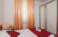 Postel nebo postele na pokoji v ubytování Apartment Supetar 43