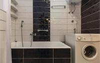 Kúpeľňa v ubytovaní Three-Bedroom Apartment In Komarna