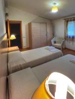 Posteľ alebo postele v izbe v ubytovaní Agriturismo Porta al Colle