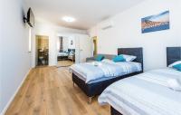 Posteľ alebo postele v izbe v ubytovaní Four-Bedroom Holiday Home In Sibenik