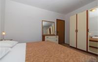 Postel nebo postele na pokoji v ubytování Apartment Racisce Bb Vi