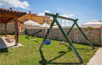 Detský kútik v ubytovaní Beautiful Apartment In Hr-52215 Vodnjan