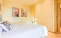 A bed or beds in a room at Lovely Apartment In Los Alcázares