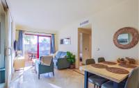 A television and/or entertainment centre at Lovely Apartment In Los Alcázares
