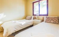 A bed or beds in a room at Lovely Apartment In Los Alcázares