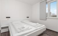 Posteľ alebo postele v izbe v ubytovaní Awesome Apartment In Kampor With Wifi