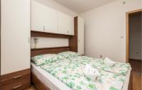 Posteľ alebo postele v izbe v ubytovaní Two-Bedroom Apartment In Zagvozd