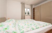 Posteľ alebo postele v izbe v ubytovaní Two-Bedroom Apartment In Zagvozd