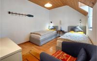 Posteľ alebo postele v izbe v ubytovaní Cozy Home In Plouguerneau With Wifi