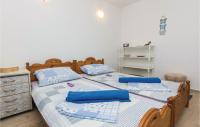 Postel nebo postele na pokoji v ubytování Holiday Home Privlaka Put Grzanove Punte
