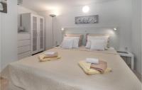 Posteľ alebo postele v izbe v ubytovaní Amazing Home In Crikvenica With Jacuzzi