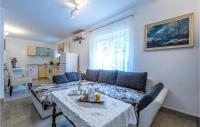 Kuchyňa alebo kuchynka v ubytovaní Holiday Home Mala Ostrica I