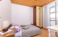 Posteľ alebo postele v izbe v ubytovaní Holiday Home Mala Ostrica I