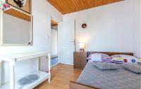 Posteľ alebo postele v izbe v ubytovaní Holiday Home Mala Ostrica I