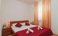 Postel nebo postele na pokoji v ubytování Apartment Supetar 43