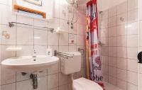 Kúpeľňa v ubytovaní Apartment Peroj Iii