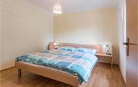 Łóżko lub łóżka w pokoju w obiekcie Holiday Home Betiga With Sea View Vi
