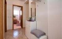 Łóżko lub łóżka w pokoju w obiekcie Holiday Home Peroj Lxxiii