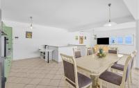 Televízia a/alebo spoločenská miestnosť v ubytovaní Holiday Home Put Zuke I