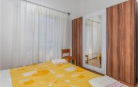 Posteľ alebo postele v izbe v ubytovaní Beautiful Apartment In Mali Losinj
