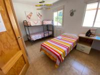 Posteľ alebo postele v izbe v ubytovaní Casa Golf y Piscina 11