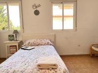 Posteľ alebo postele v izbe v ubytovaní Casa Golf y Piscina 11