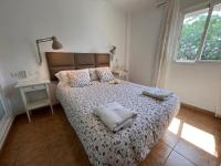 Posteľ alebo postele v izbe v ubytovaní Casa Golf y Piscina 11