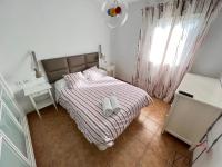 Posteľ alebo postele v izbe v ubytovaní Casa Golf y Piscina 11