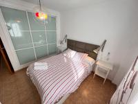 Posteľ alebo postele v izbe v ubytovaní Casa Golf y Piscina 11