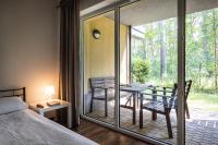 Posteľ alebo postele v izbe v ubytovaní Natura Resort