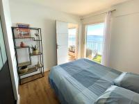 Posteľ alebo postele v izbe v ubytovaní Frejus Plage - T2 -Vue mer féérique