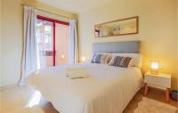 A bed or beds in a room at Lovely Apartment In Los Alcázares