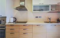 A kitchen or kitchenette at Lovely Apartment In Los Alcázares
