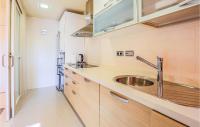 A kitchen or kitchenette at Lovely Apartment In Los Alcázares