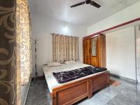 Srishti Homestayにあるベッド