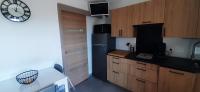 Kuchnia lub aneks kuchenny w obiekcie Appartement T2, terrasse, piscine, clim, proche plage