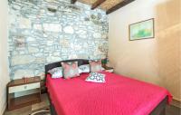Posteľ alebo postele v izbe v ubytovaní Stunning Home In Peroj