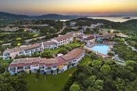 an aerial view of a resort with a pool at Grand Hotel In Porto Cervo in Porto Cervo