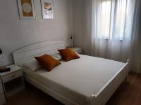 Postel nebo postele na pokoji v ubytování Apartments Vig