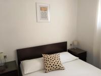Postel nebo postele na pokoji v ubytování Apartments Vig
