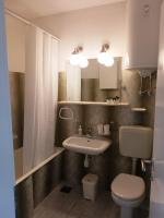 Koupelna v ubytování Apartments Vig