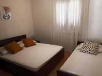 Postel nebo postele na pokoji v ubytování Apartments Vig