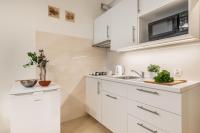 Kuchyňa alebo kuchynka v ubytovaní P&O Podwale Apartments